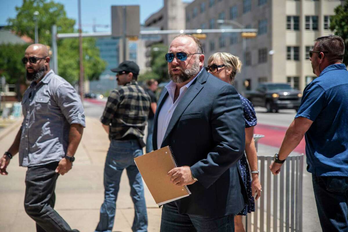 Alex Jones arrives and speaks to the media outside the 459th Civil District Court on Tuesday, Aug. 2, 2022 in Austin, TX. Neil Heslin and Scarlett Lewis are suing Alex Jones and InfoWars over his repeated claims that the 2012 shooting at Sandy Hook Elementary was a "false flag operation" conducted by the government. (Sergio Flores/Hearst Media)