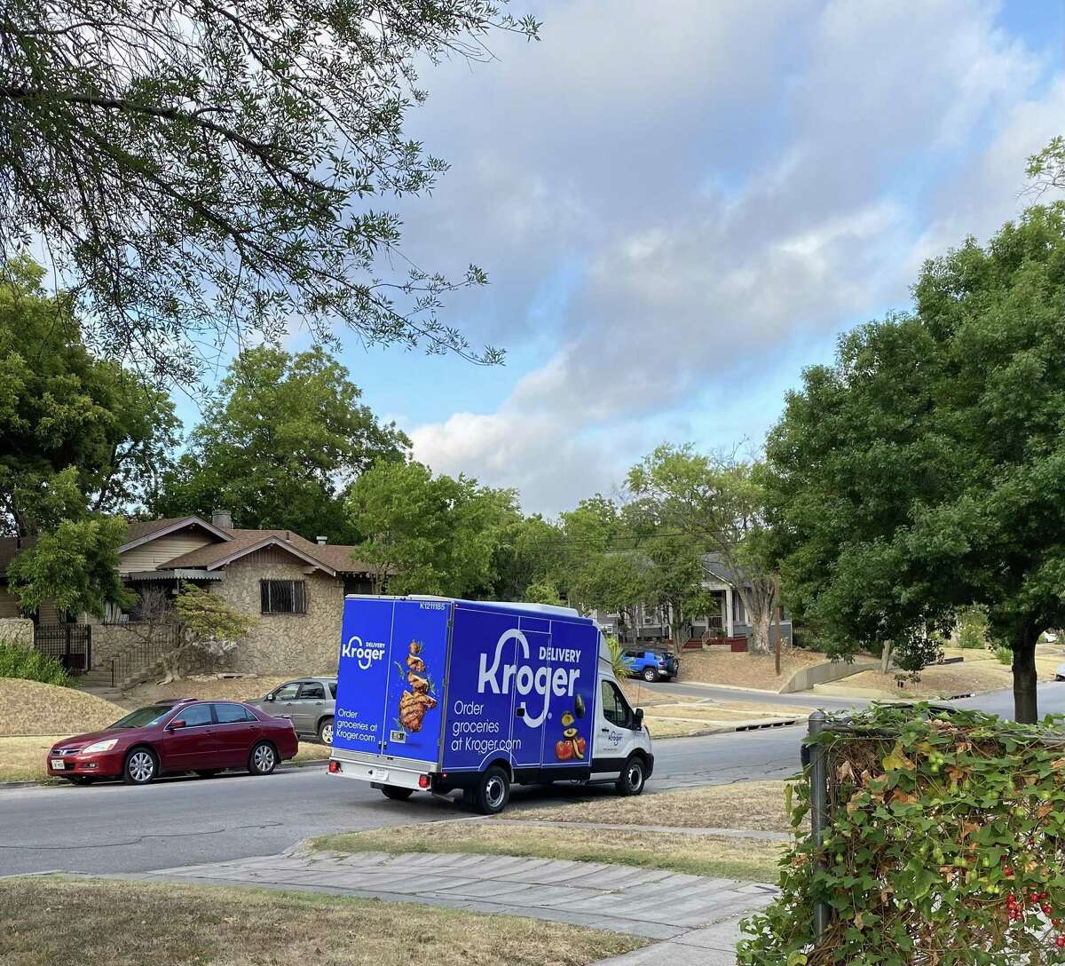 A Kroger delivery truck operating Wednesday in a San Antonio neighborhood.