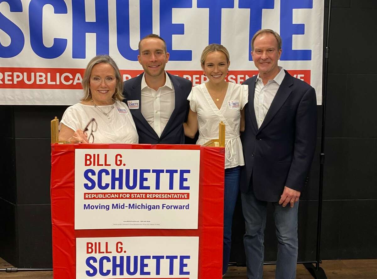 Bill G. Schuette (center-left) at his primary victory celebration