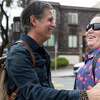 Patrick Combs reunites with Searcy Hughes, a woman who Combs helped deliver on the sidewalk when she was a baby 33 years ago in San Francisco, Calif. Wednesday, Aug. 3, 2022.