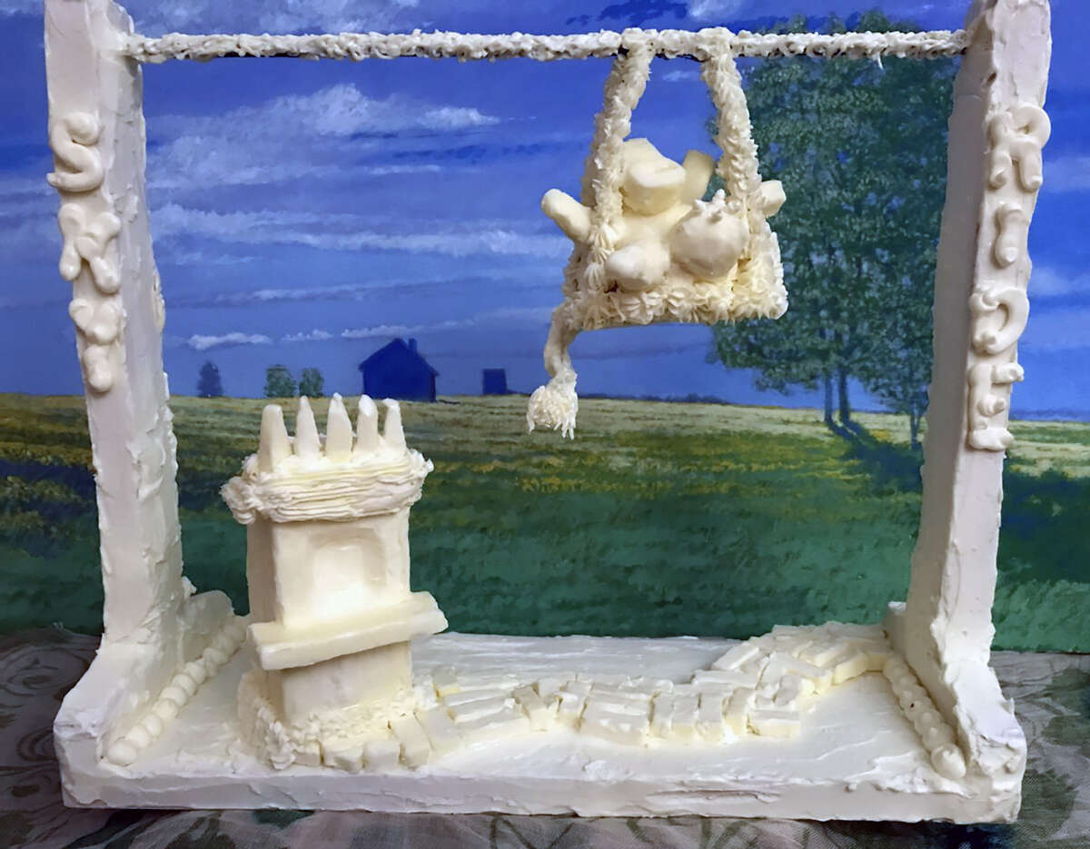 "Sky-Riding Brown Swiss" is Pam Martin's 2022 entry in the Miniature Butter Cow contest affiliated with the Illinois State Fair. Martin, who won the competition in 2020 and 2021, bases her designs on "fun things at the fair," she said.