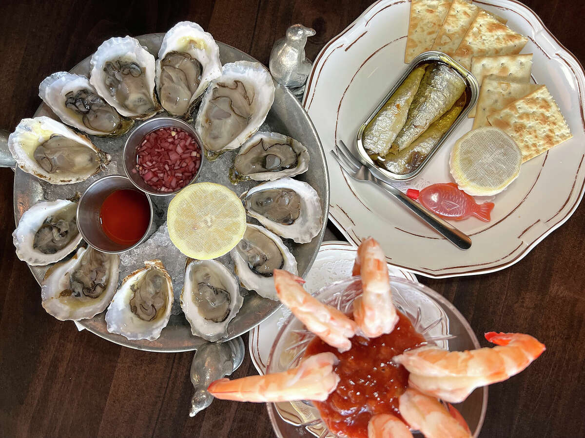 Fresh East Coast Oysters, tinned sardines and shrimp cocktail are part of the menu at Double Standard, a tavern and restaurant at the Rand Building in downtown San Antonio. 