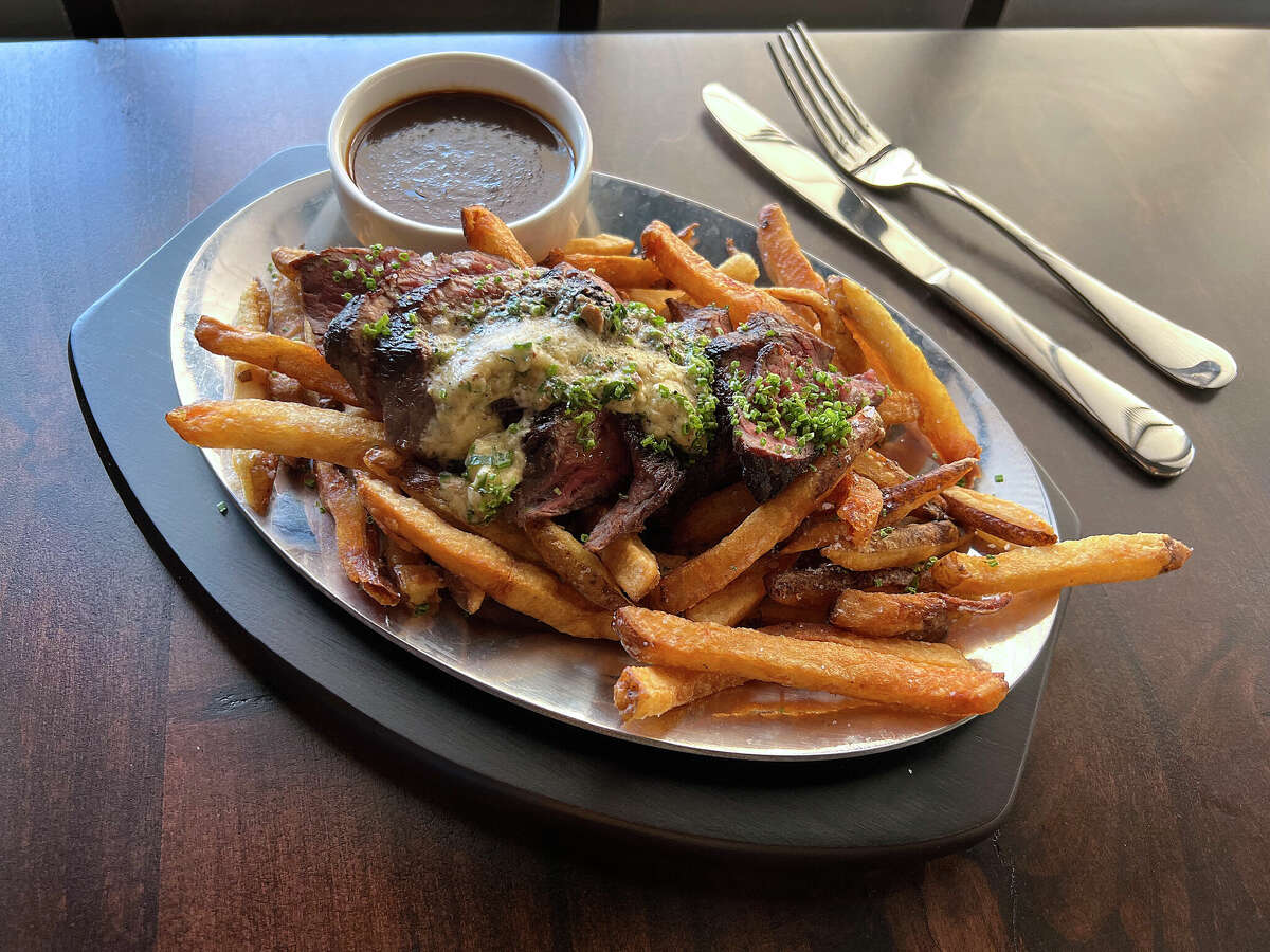 Steak frites come with foie gras butter, fries and steak sauce at Double Standard, a tavern and restaurant at the Rand Building in downtown San Antonio. 