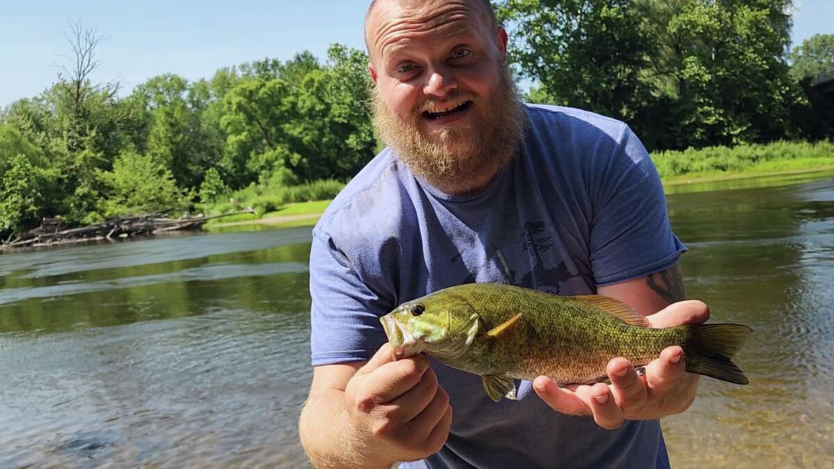 Tomas Truax recently fished the Muskegon River and hooked several Small Mouth bass.