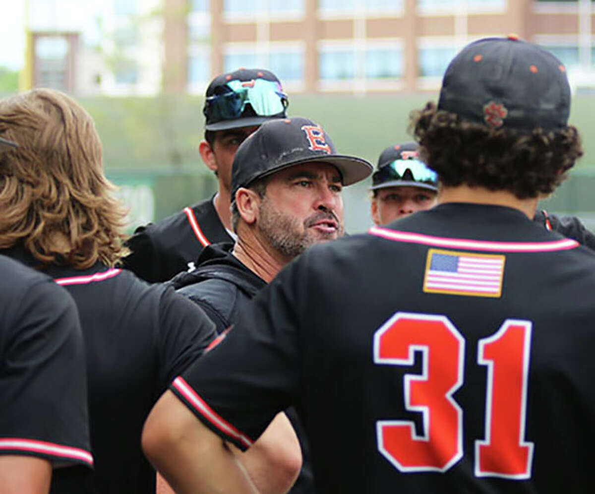 Edwardsville coach Tim Funkhouser (middle) talks with his team during the seventh inning of the Class 4A super-sectional at Bloomington in June. Funkhouser is the 2022 Telegraph Large-Schools Baseball Coach of the Year.
