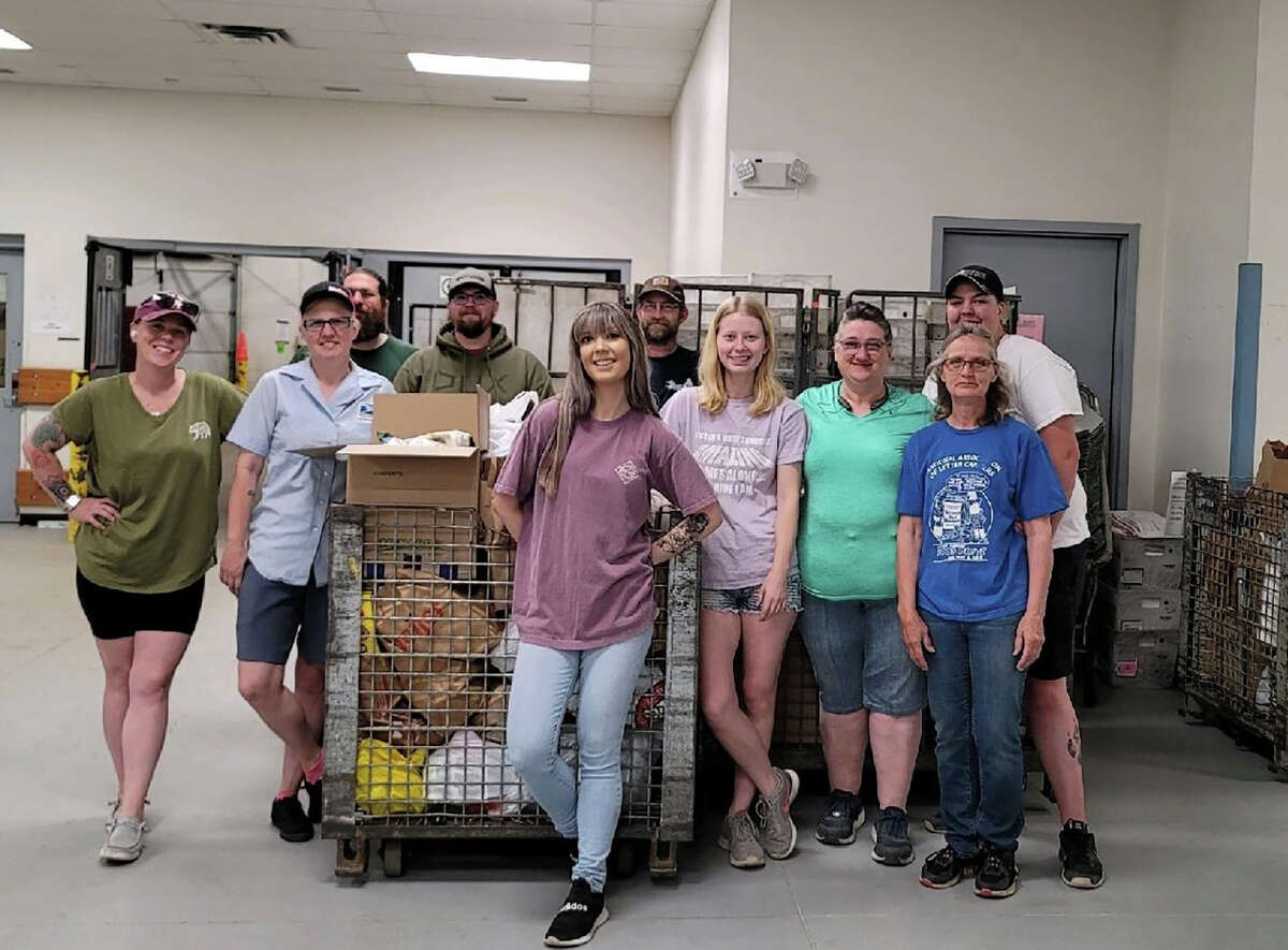 Personnel from Post Office Branch 794 in Big Rapids donated 3,200 pounds of food to Project Starburst from their food drive this past May.
