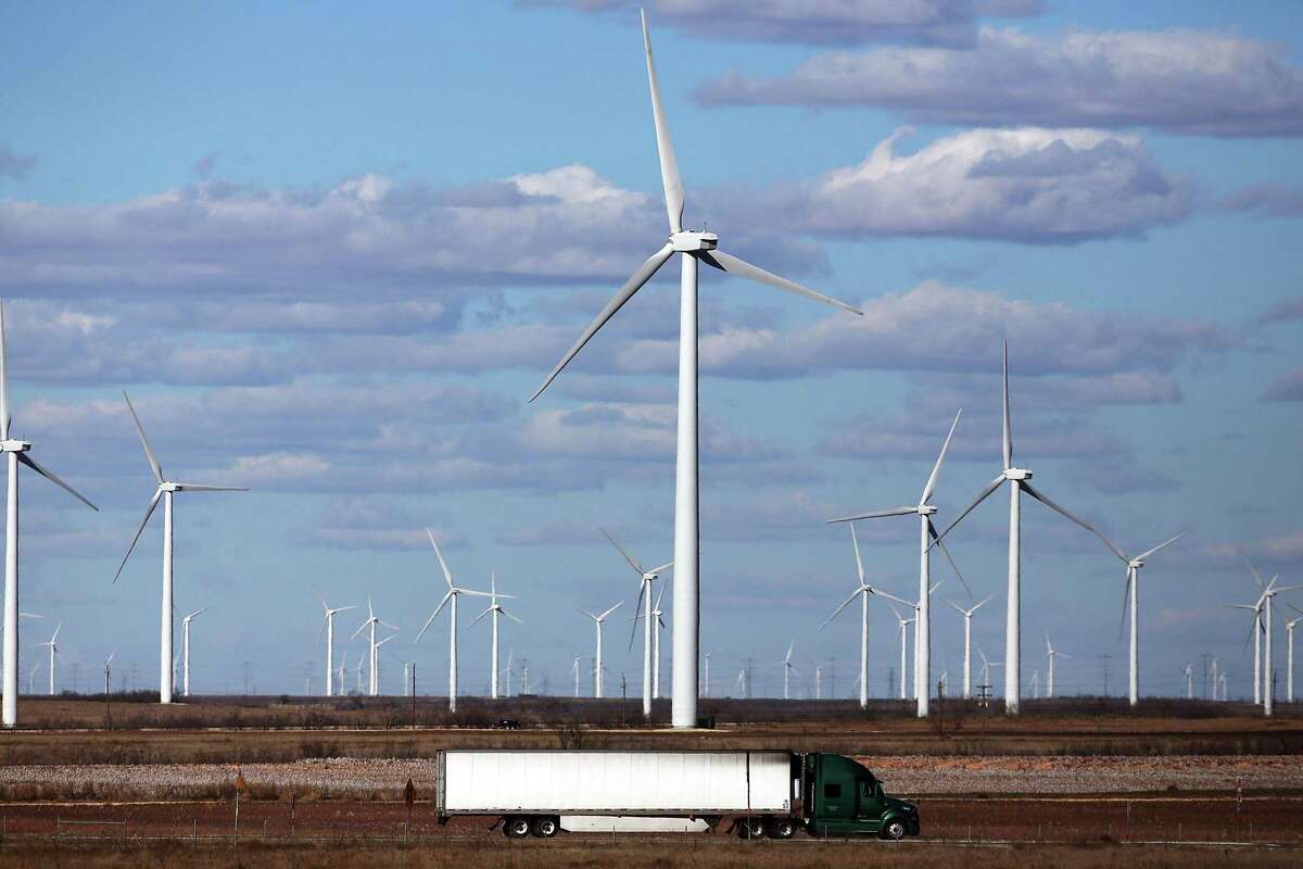 Wind turbines operate at a wind farm in Colorado City in West Texas in January 2016. Wind energy farms in West Texas and the Texas Panhandle often generate more electricity than its region can use, but insufficient transmission infrastructure prevent that energy from being shared with other parts of the state that could use it.