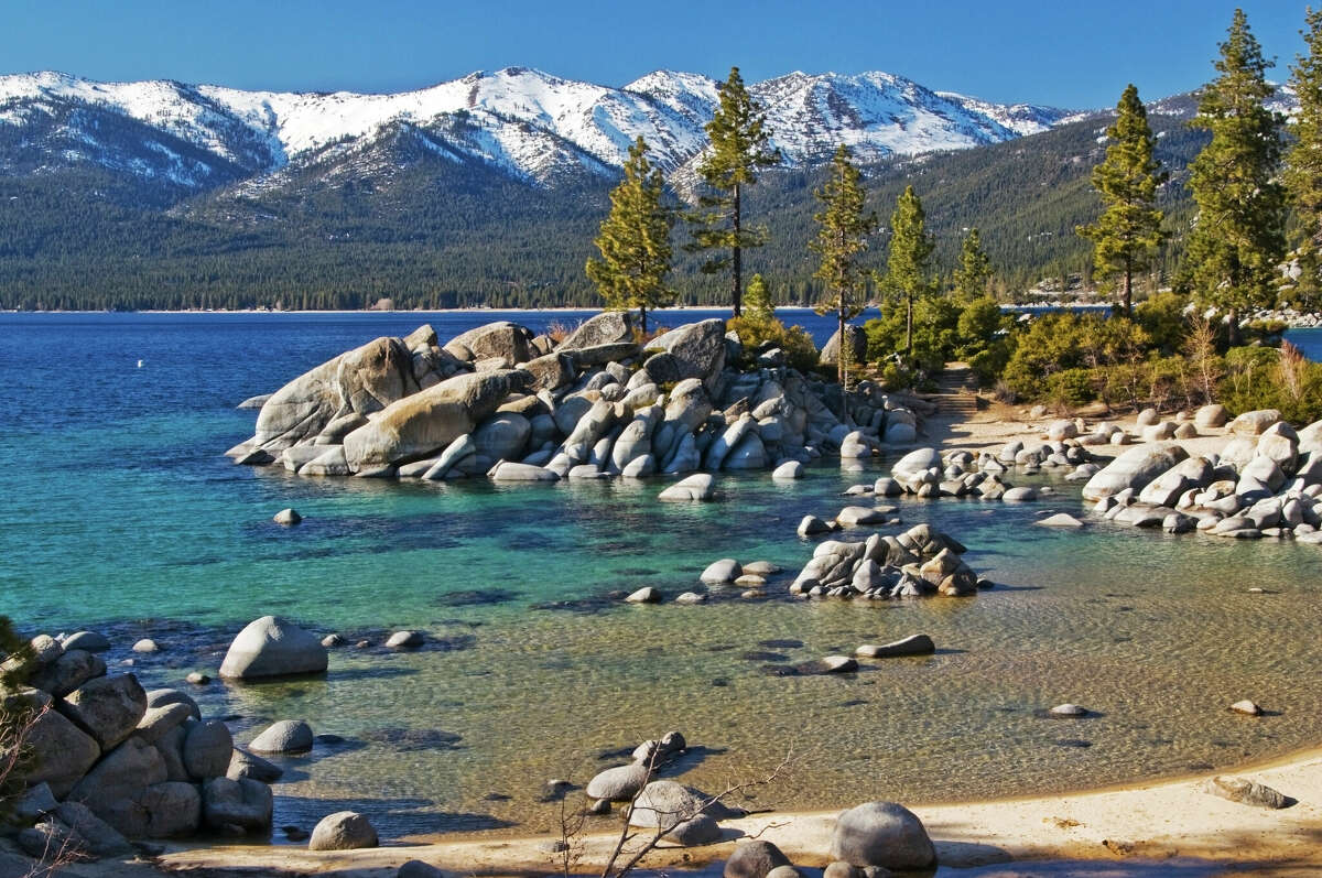 With turquoise waters, sandy beaches and granite cliffs, Sand Harbor is a popular destination in Lake Tahoe.