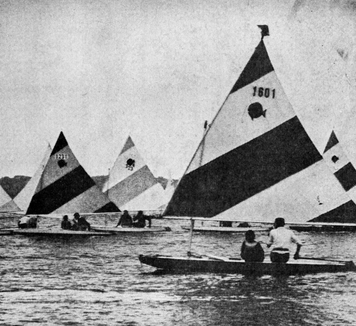 Over the weekend the Michigan championships for Sunfish and Sailfish sailboats were hosted on Manistee Lake Saturday and at Portage Lake on Sunday. In all, 38 boats took part in the four races with the two classes racing separately. The photo was published in the News Advocate on Aug. 6, 1962.