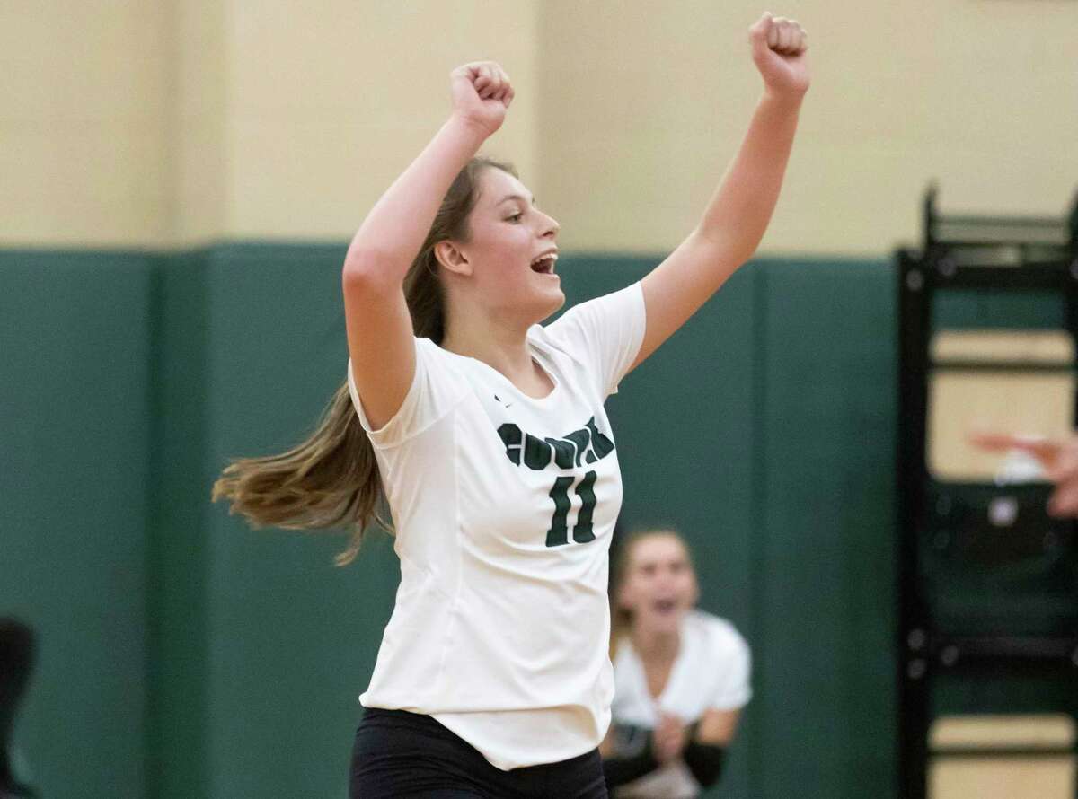 John Cooper Lauren Wolford (11) reacts after they score during the first set of a non-district volleyball game against Northland Christian at John Cooper High School, Tuesday, Aug. 17, 2021, in The Woodlands.