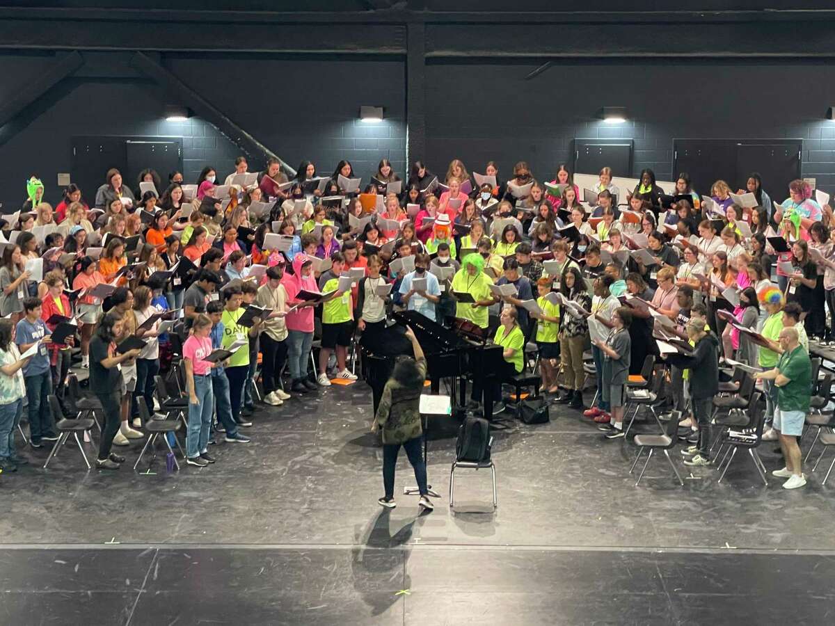 Students practice during choir camp at Alvin High School.