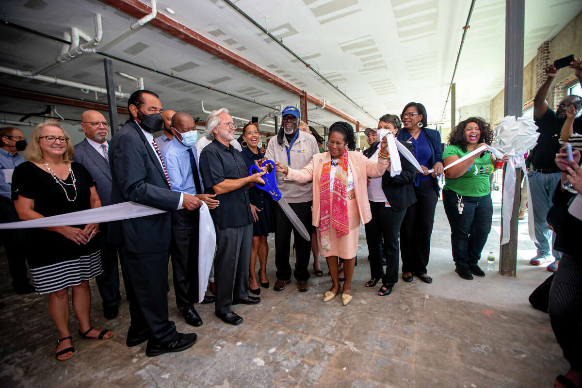 Congressman Al Green, Houston Mayor Sylvester Turner, Tim Cantwell and Congresswoman Sheila Jackson Lee join others during the ribbon cutting ceremony at Light Rail Lofts, Thursday, August 4, 2022, in Houston. 