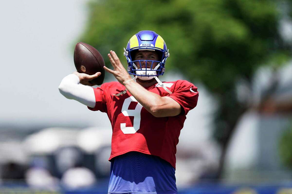 Los Angeles Rams quarterback Matthew Stafford throws a pass at the NFL football team's practice facility Monday, Aug. 1, 2022, in Irvine, Calif. (AP Photo/Jae C. Hong)