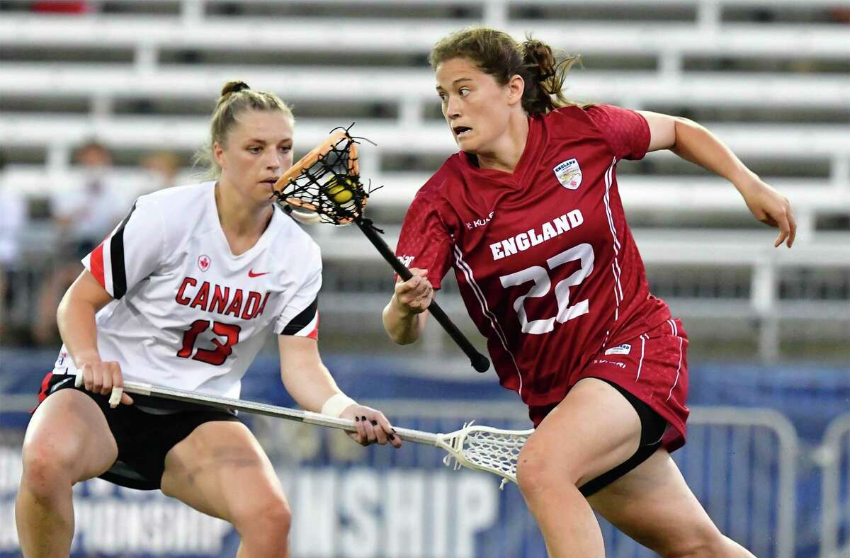 Olivia Hompe (22) in action for England during a game against Canada at the women's lacrosse World Championship in Towson, Maryland in July.