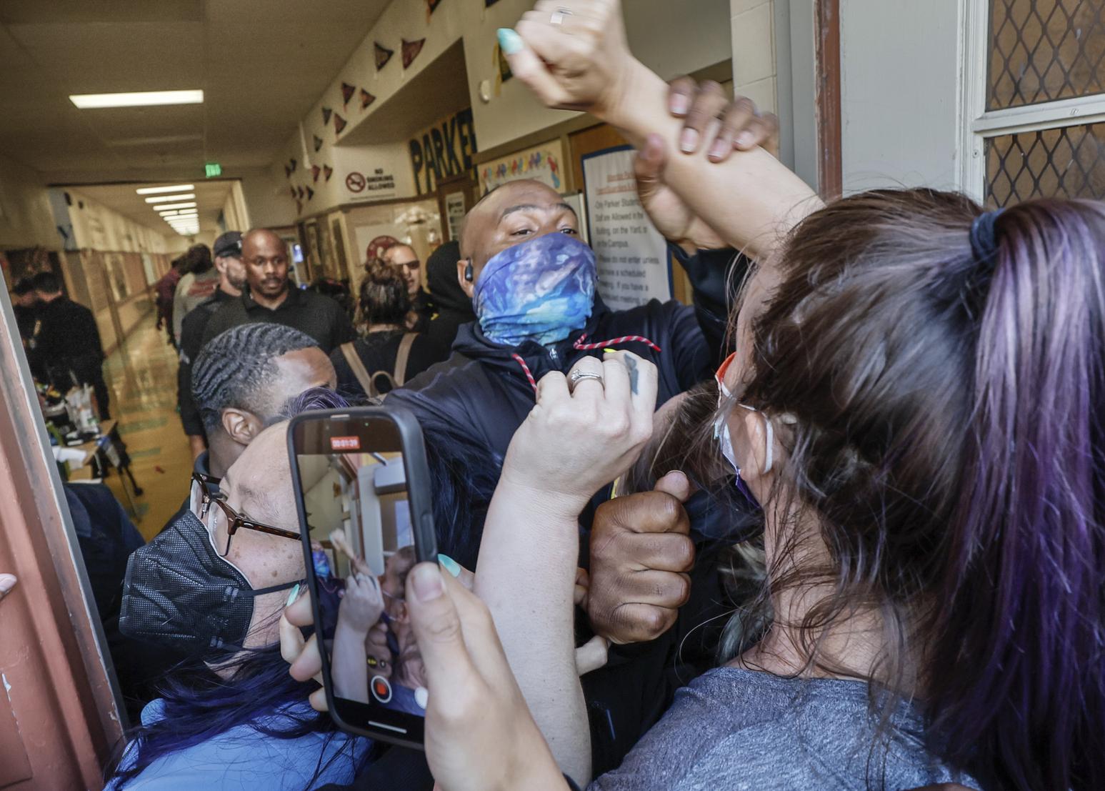 Oakland schools security officers clash with protesters occupying closed Parker Elementary School - Vimarsana News