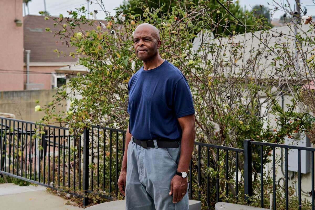 Daryl Meeks, 64, in front of a cotton tree that his father planted at home in Los Angeles. Meeks learned in his 20s that Freddie Meeks was one of the Port Chicago 50.