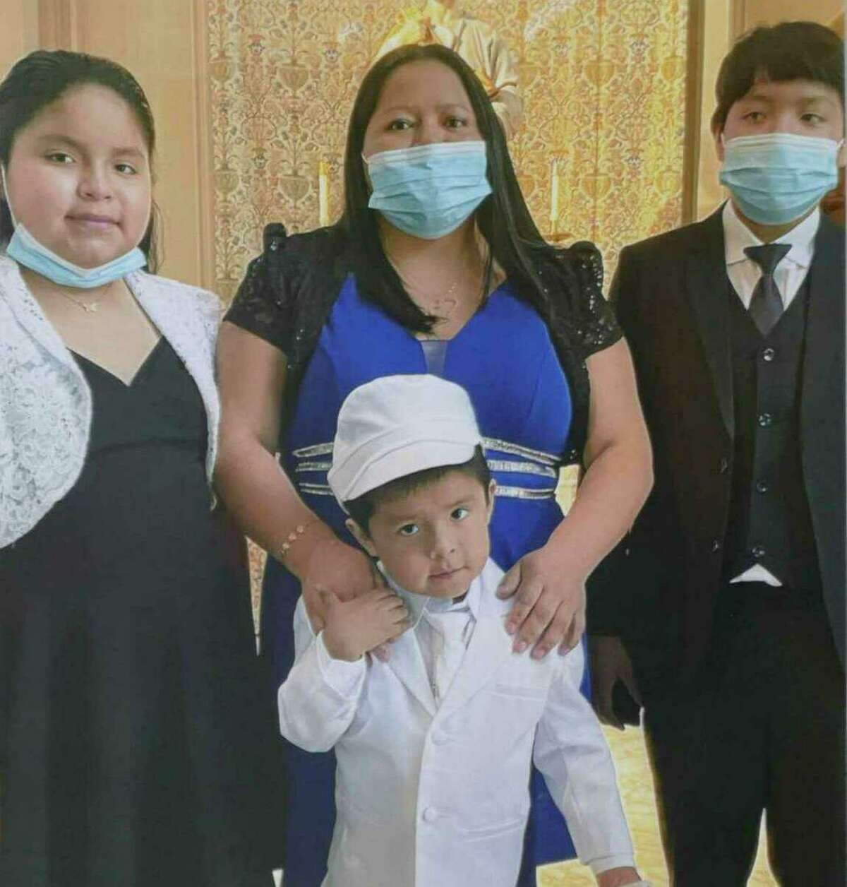 An undated photo of Sonia Loja, 36, center, Junior Panjon, 12, right, Joselyn Panjon, 10, left, and Jonael Panjon, 5, front center. A funeral will be held for the mother and her three children at St. Peter Church in Danbury on Friday morning.