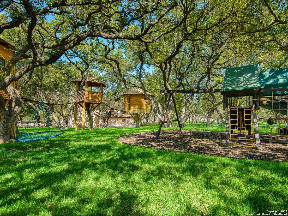 A listing for a Hill Country Village $5.9 million mansion boasts amenities such as its “formidable gated entry connected to (a) high-walled perimeter” surrounding the 6.81-acre property “hidden within” the small North Side city along U.S. 281. 