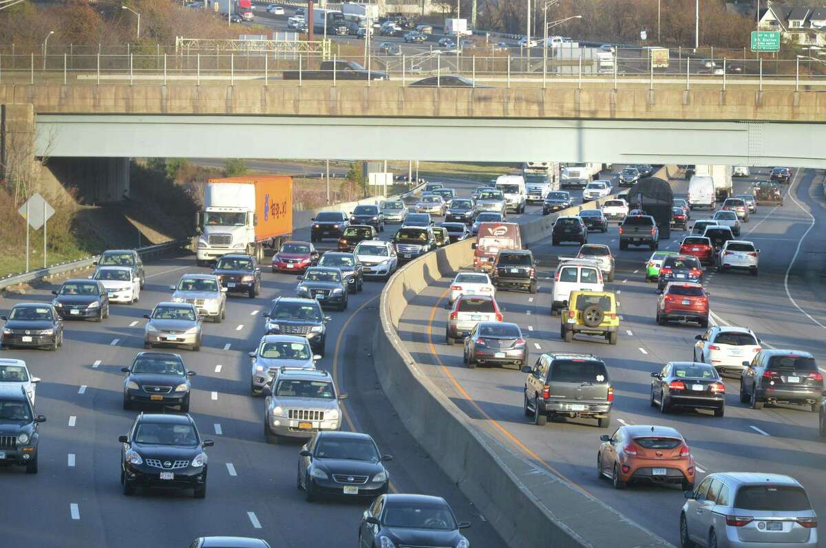 Traffic builds on Interstate 95 looking north to exit 16 through Norwalk Conn. on Tuesday November 21, 2017 as the Thanksgiving holiday weekend approaches.