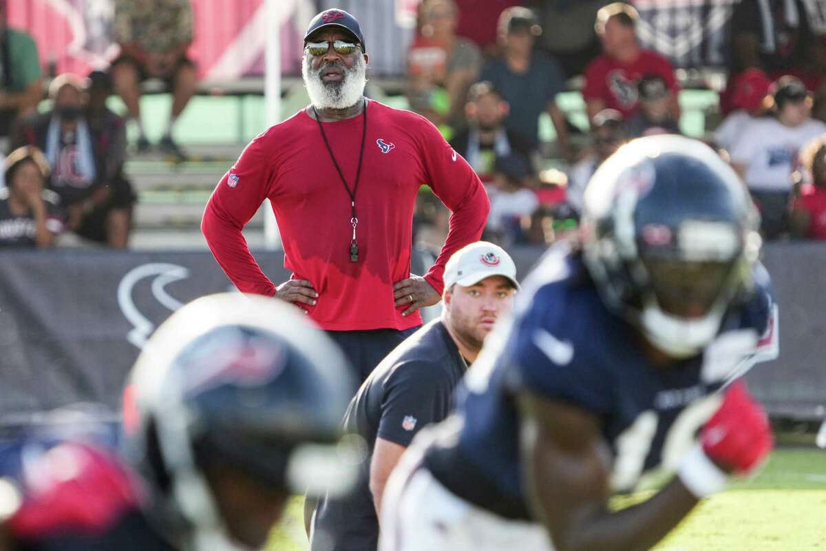 Houston Texans head coach Lovie Smith watches his players run drills during an NFL training camp Friday, Aug. 5, 2022, in Houston.