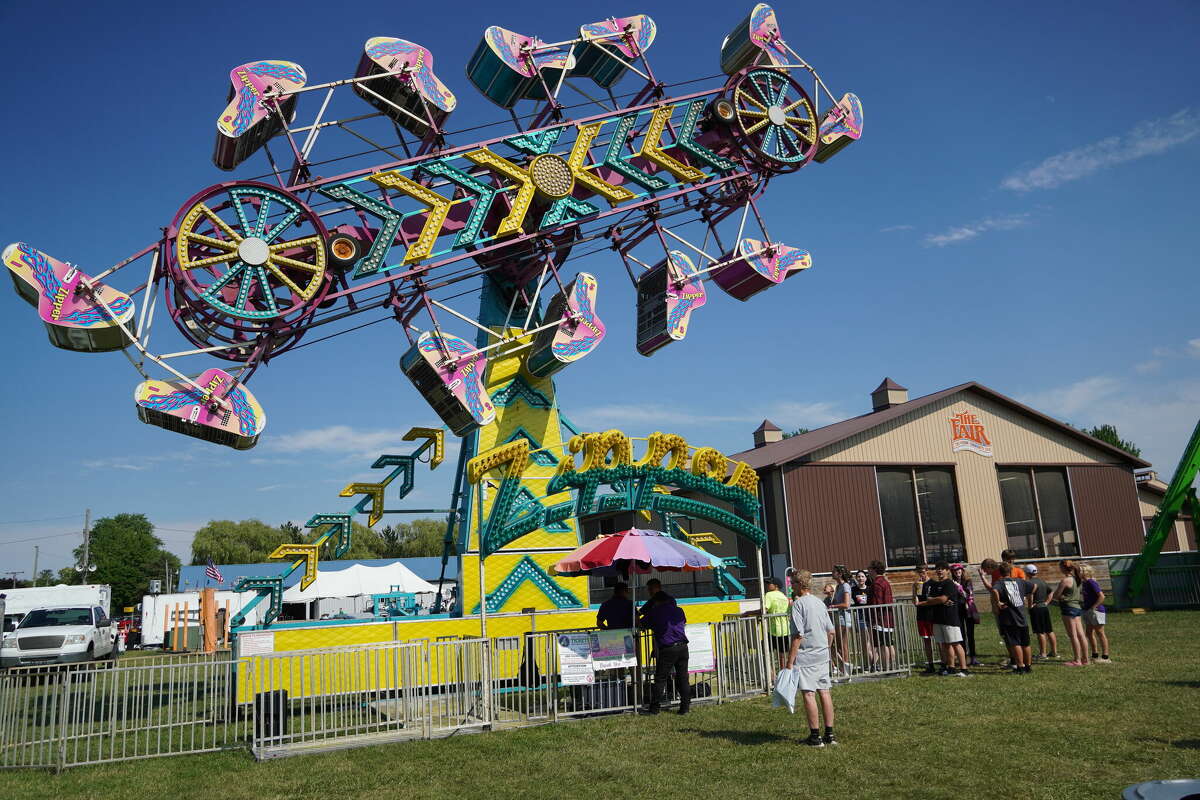 People enjoy one of the rides at this year's Huron Community Fair. 