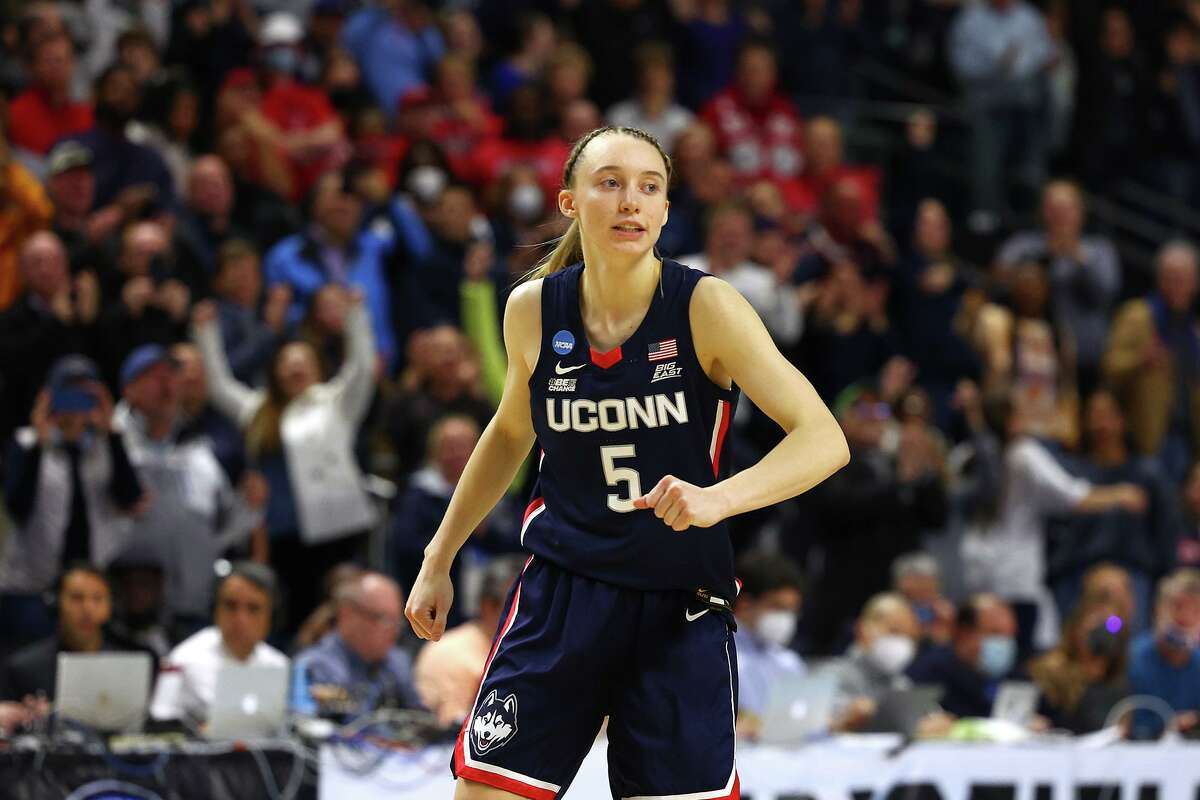 Paige Bueckers of the UConn Huskies reacts after defeating the NC State Wolfpack 91-87 in in the NCAA Women's Basketball Tournament Elite 8 Round at Total Mortgage Arena on March 28, 2022, in Bridgeport.
