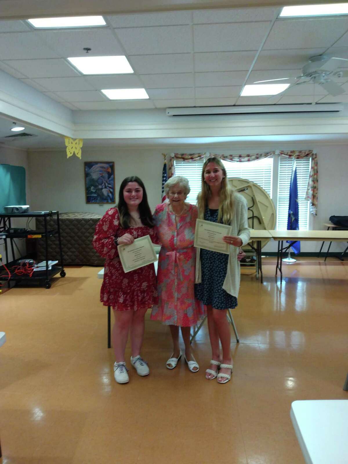 The Women's Club of Cheshire awarded two scholarships: to a student and a teacher; both from Cheshire High School. Anna Proto is attending Southern University. She will be furthering her adult education in the Business field. Erin Esposito is majoring in marketing. From left are Erin Esposito, member Jane Richards center and Anna Proto.