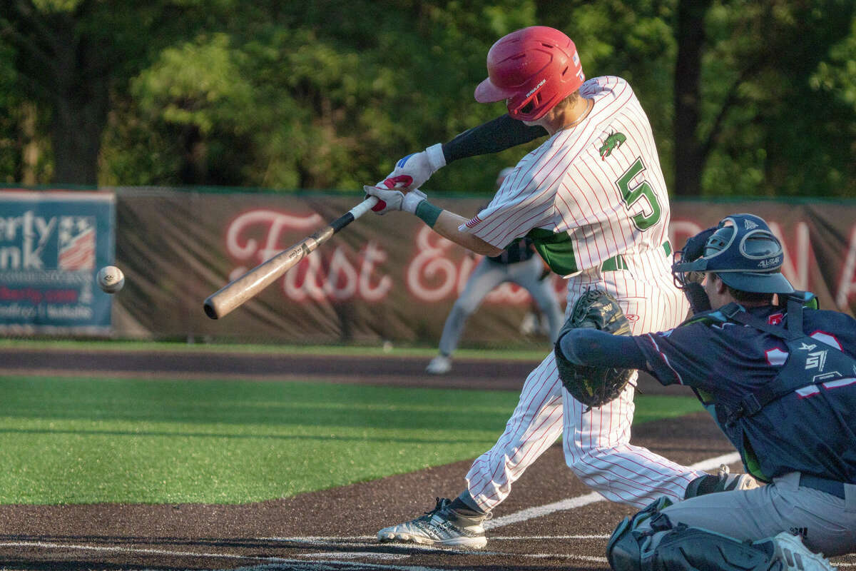 Blake Burris of the River Dragons reached on an infield hit and eventually came around to score winning winning run on a sacrifice fly by Cameron Hailstone in the 11th inning of Thursday night's game against the Burlington Bees in Burlington, Iowa.