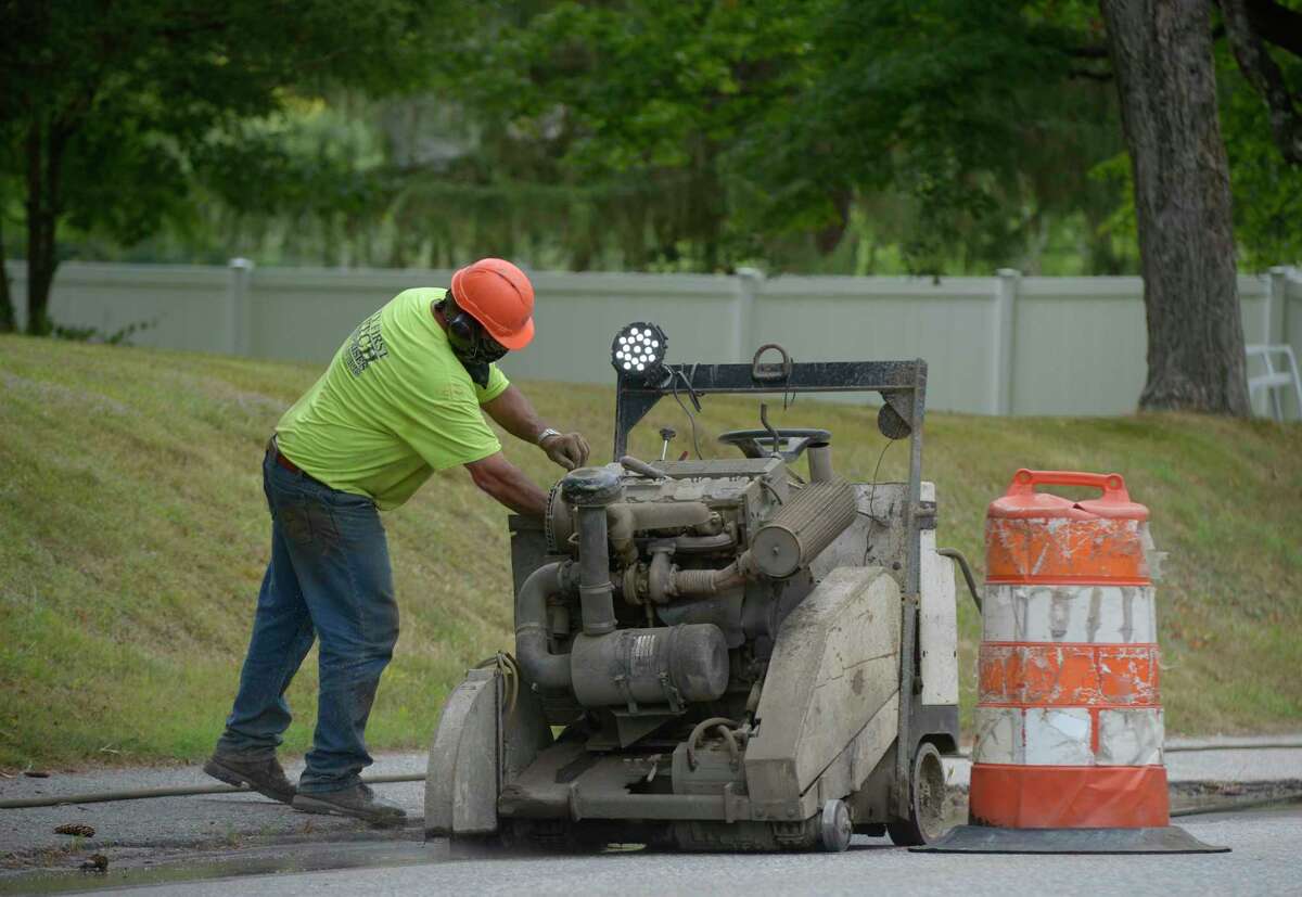 Construction on the Kent Streetscape project began after 14 years of planning. Construction crew makes curb cuts along Bridge Street on Tuesday afternoon. August 2, 2022, Kent Conn.