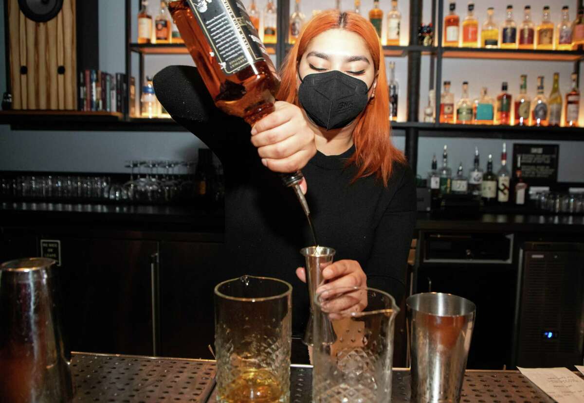 A bartender prepares drinks at Bar Shiru, a hi-fi bar in Oakland.