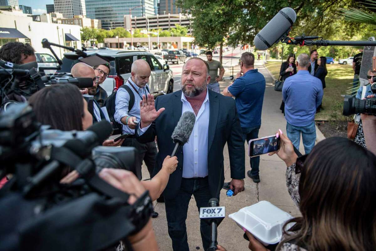 Alex Jones speaks to the media outside the 459th Civil District Court on Tuesday, Aug. 2, 2022 in Austin, TX. Neil Heslin and Scarlett Lewis are suing Alex Jones and InfoWars over his repeated claims that the 2012 shooting at Sandy Hook Elementary was a "false flag operation" conducted by the government. (Sergio Flores/Hearst Media)