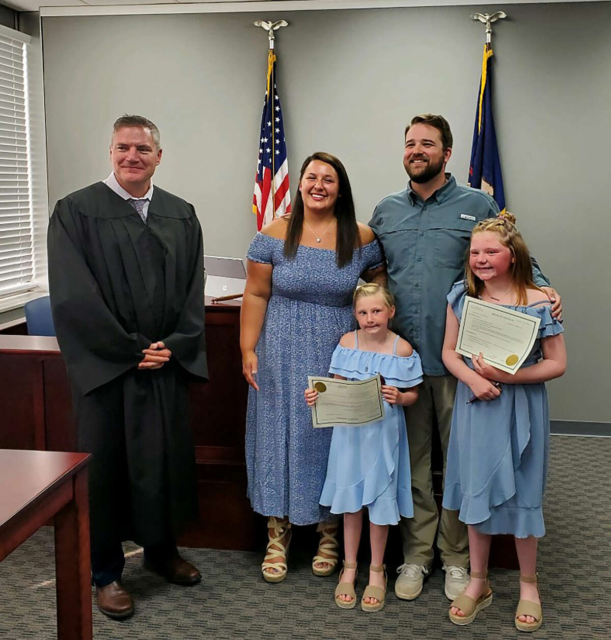 Zach and Haley Francis live in Lake Ann with their two daughters, Liv and Audie. The couple adopted the sisters on July 15 with assistance from Child & Family Services.