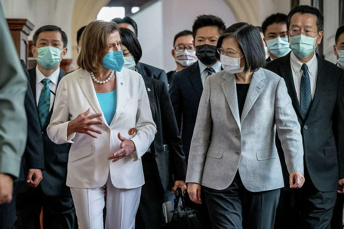 House Speaker Nancy Pelosi speaks with Taiwan's President Tsai Ing-wen. There was little upside to her visit and lots of potential geopolitical tension.