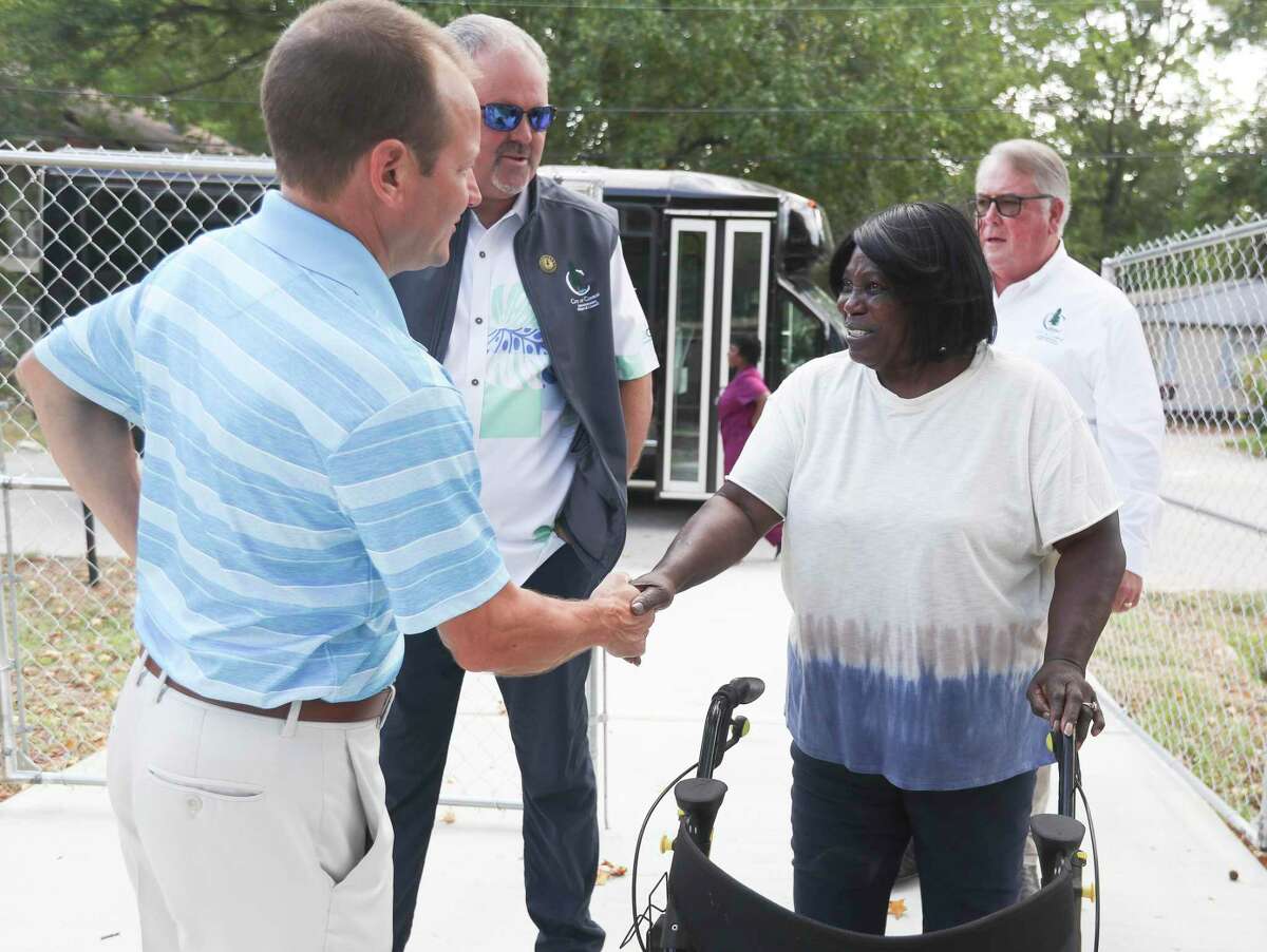 Odessa Sneed, right, meets Conroe Mayor Jody Czajkoski during a Community Development Block Grant home tour in Conroe, Thursday, Aug. 4, 2022, in Conroe. The CDBG is a federally funded program that provides home for low-income residents.