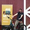 “4000 Miles” actor Clay Singer admires the Cannondale Adventure 1 Bike. Photo by Cynthia Astmann