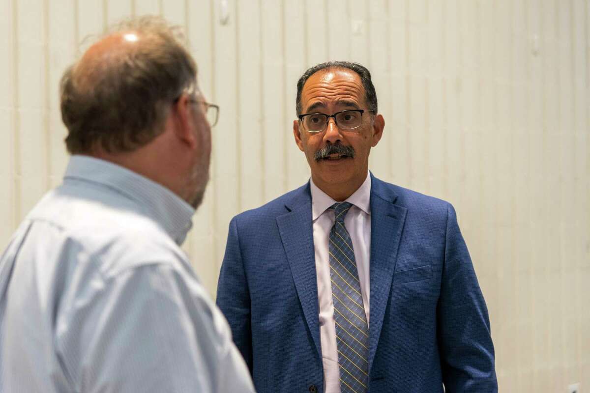 Trumbull Public Works Director George Estrada speaks to Richard White, a town resident at the Community Facilities Building Committee meeting in Trumbull Conn. on Aug. 3.