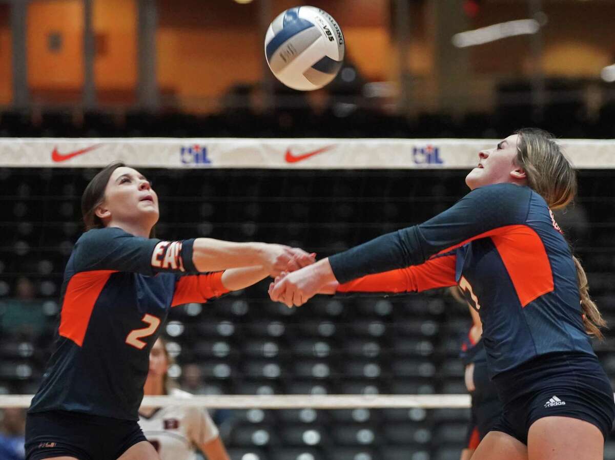 Bridgeland High School's Lauren Barber (2) and Grace Orlando (7) team up in their semifinal volleyball match against Northsidei Brandeis High School in Garland, Texas on Friday, November 19, 2021. Brandeis won. CREDIT: Louis DeLuca for The Houston Chronicle