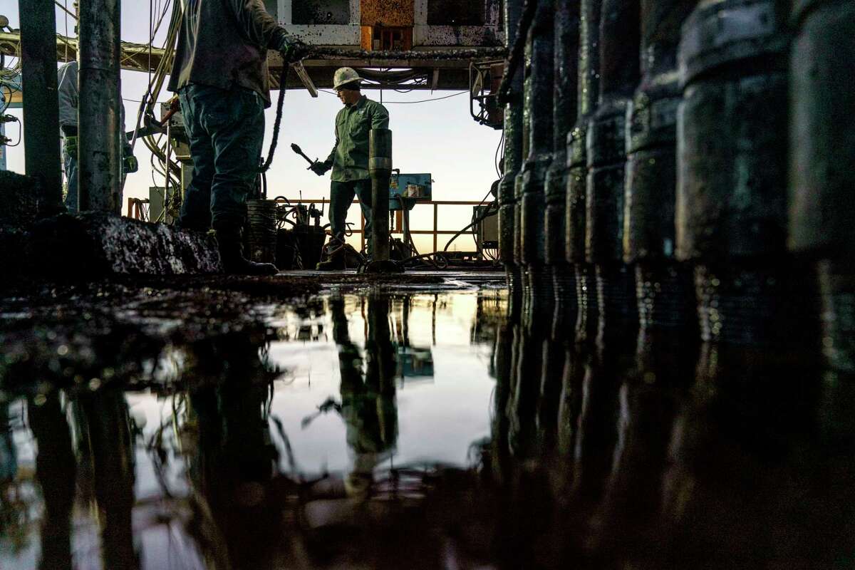 Kory Mercantel works on a drilling rig in the Permian Basin in Odessa. Occidental Petroleum is planning a series of massive industrial projects, including in Odessa, to pull tens of millions of tons of carbon dioxide out of the air. The oil company is seeking substantial state tax breaks to help finance the operations, which are intended to help curb climate change.