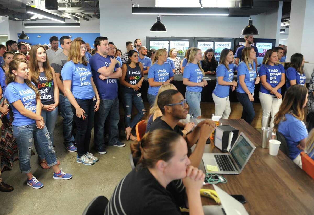 Indeed employees listen to speakers in the company’s downtown Stamford offices during a press conference on July 12, 2017 to announce the career-services company’s plan to add 500 jobs in Stamford during the next few years, with the support of millions of dollars in state subsidies.