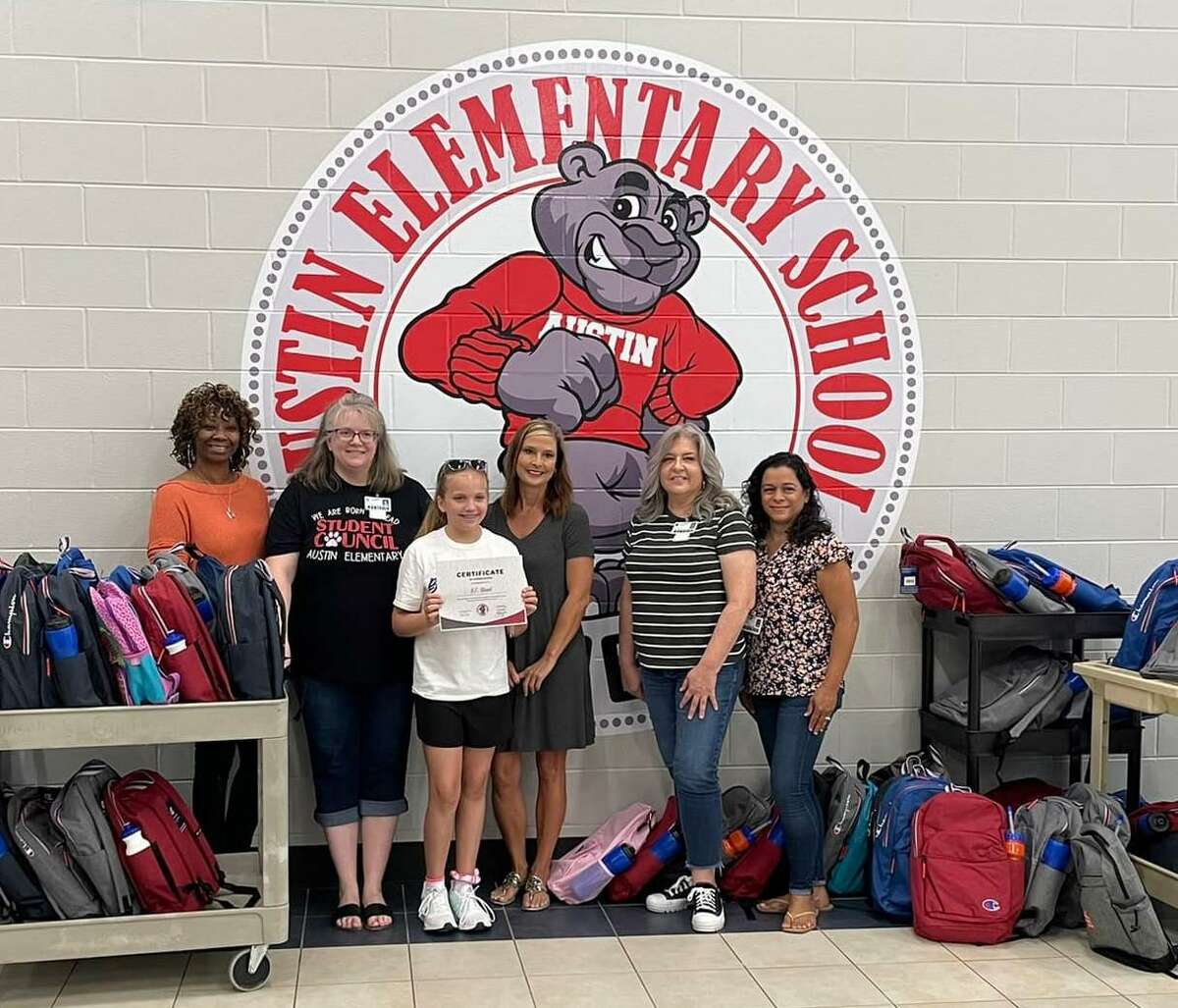 Since 2015, 12-year-old Baily Cowart has donated backpacks and school supplies to Conroe ISD schools. That first-year donation that could fit in a wagon has now snowballed into Cowart’s nonprofit B.E. Blessed that visited 11 Conroe ISD schools this past Monday delivering 839 filled backpacks so children returning to school can have everything that they need to get the school year off to a great start.