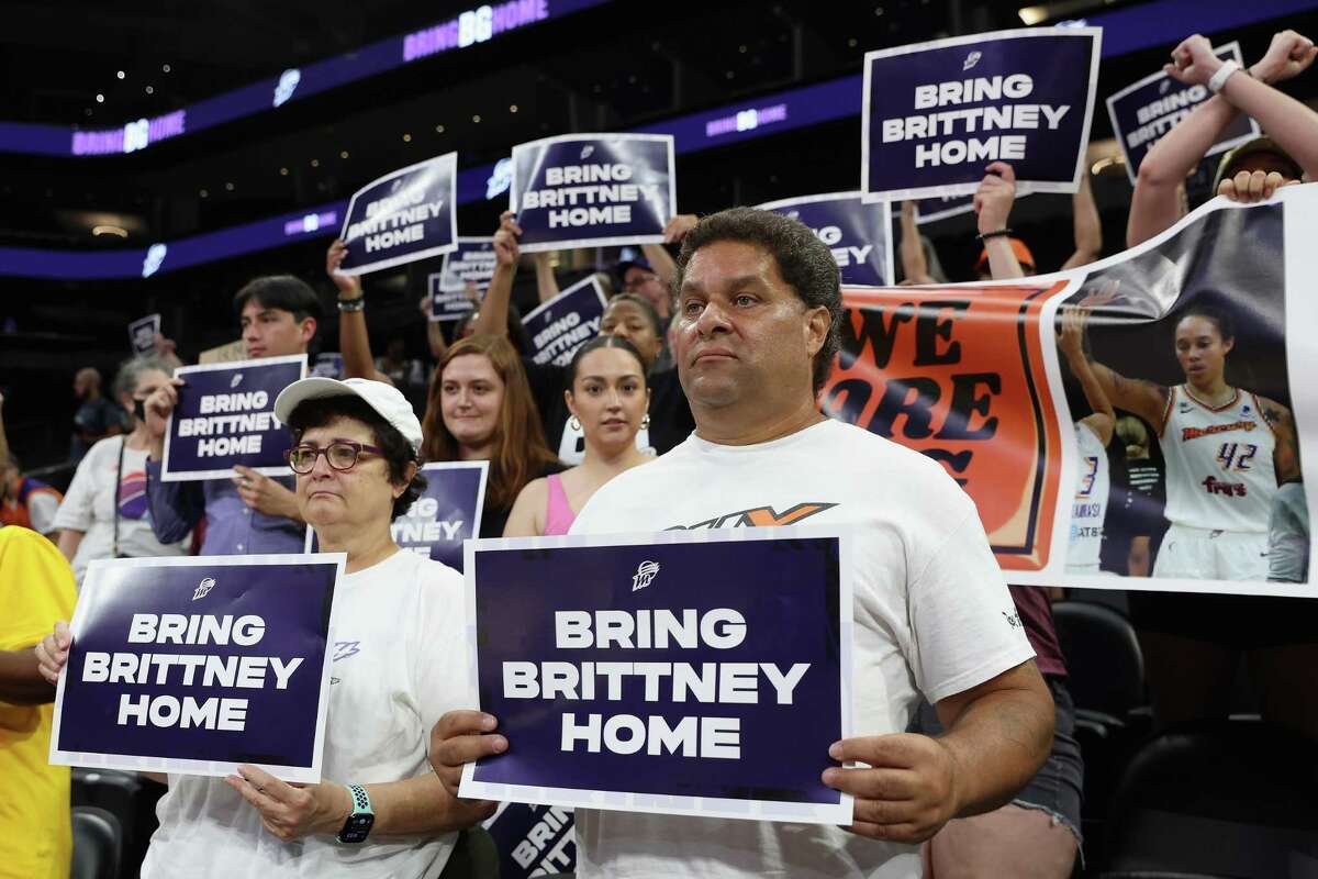 PHOENIX, ARIZONA - JULY 06: Supporters hold up signs reading &quot;Bring Brittney Home&quot; during a rally to support the release of detained American professional athlete Britney Griner at Footprint Center on July 06, 2022 in Phoenix, Arizona. WNBA star and Phoenix Mercury athlete Brittney Griner was detained on February 17 at a Moscow-area airport after cannabis oil was allegedly found in her luggage. (Photo by Christian Petersen/Getty Images)