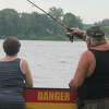 Fishing from the docks at area lakes continues to be popular for anglers.