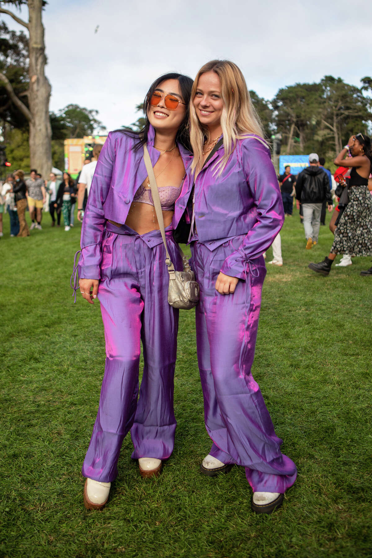 (Left to right) Vivian Fenn and Natalie Williams wear complementary outfits at Outside Lands in Golden Gate Park, San Francisco, CA on August 5, 2022.