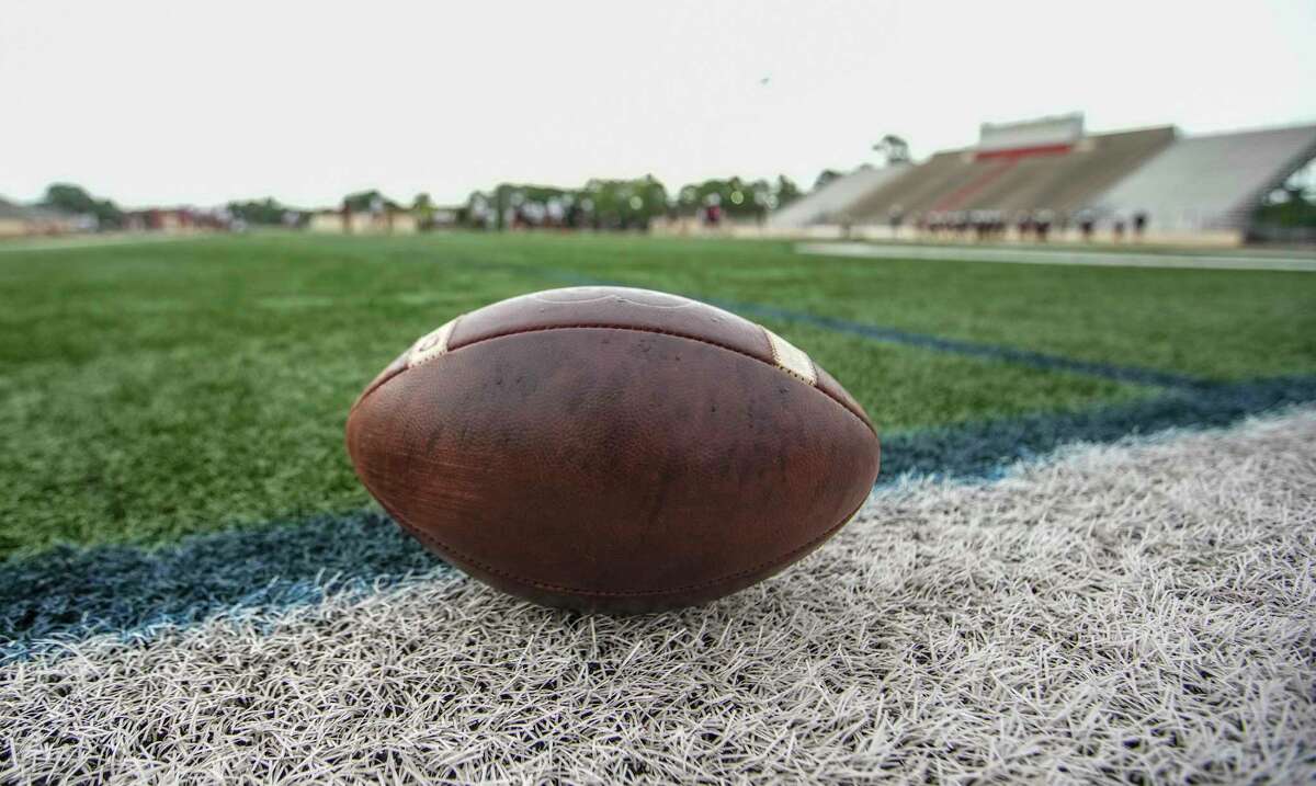 A football on the field during Varsity and JV football practice at Tomball High School on Friday, Aug. 5, 2022 in Tomball.