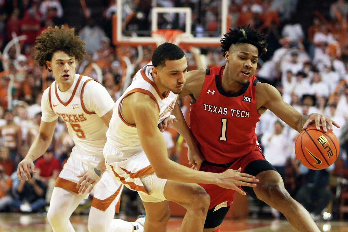 Texas forward Dylan Disu, center, figures to play a key role for a Longhorns team whose lack of size was a key factor in a second-round NCAA Tournament loss to Purdue last season.