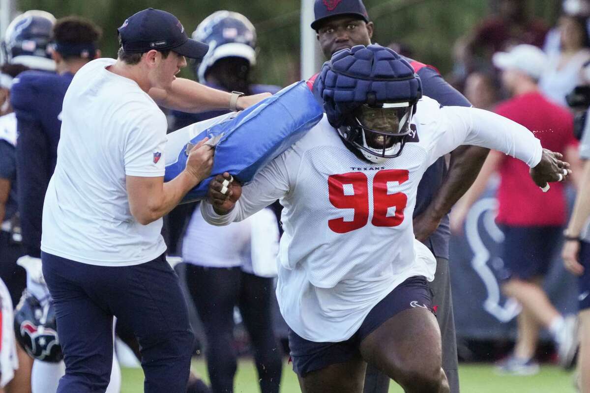Houston Texans defensive lineman Maliek Collins (96) runs a punt block drill during an NFL training camp Saturday, Aug. 6, 2022, in Houston.