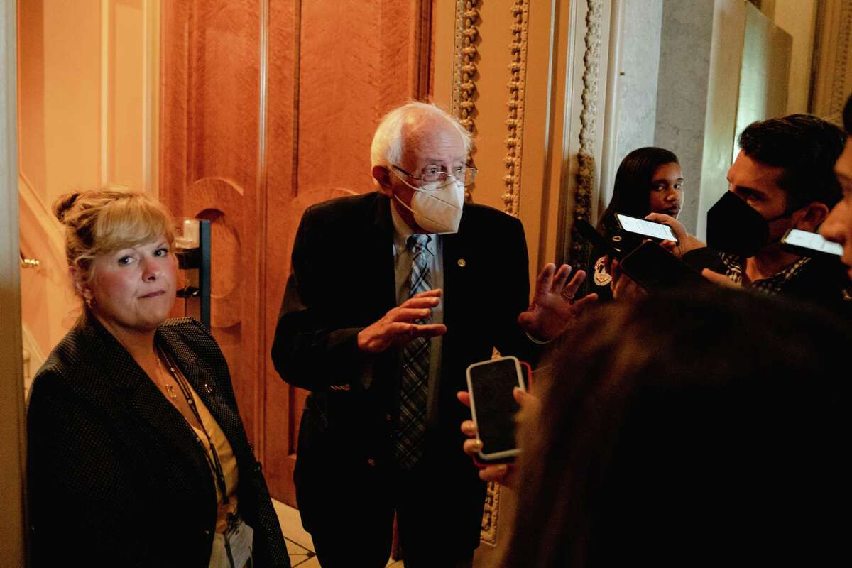 Senator Bernie Sanders, I-Vt., speaks with reporters before walking in the Senate Chamber on Capitol Hill in Washington, D.C., on Aug. 6, 2022.