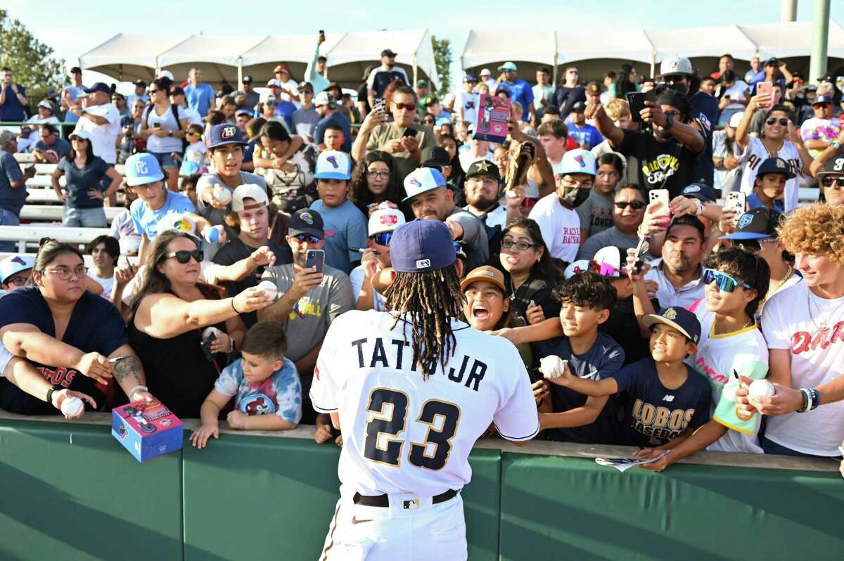 Fernando Tatis Jr. signs autographs before the start of Saturday’s Missions home game against the Wichita Wind Surge at Wolff Stadium in San Antonio.