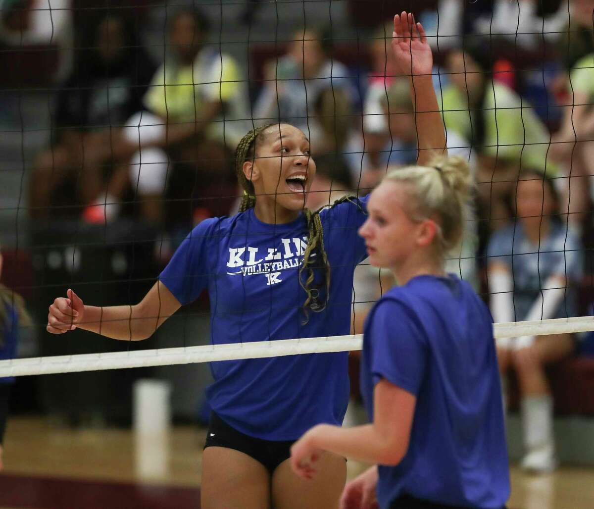 Klein middle blocker Mikayla Sampson reacts after scoring a point during a high school volleyball scrimmage at Summer Creek High School, Saturday, Aug. 6, 2022, in Houston.