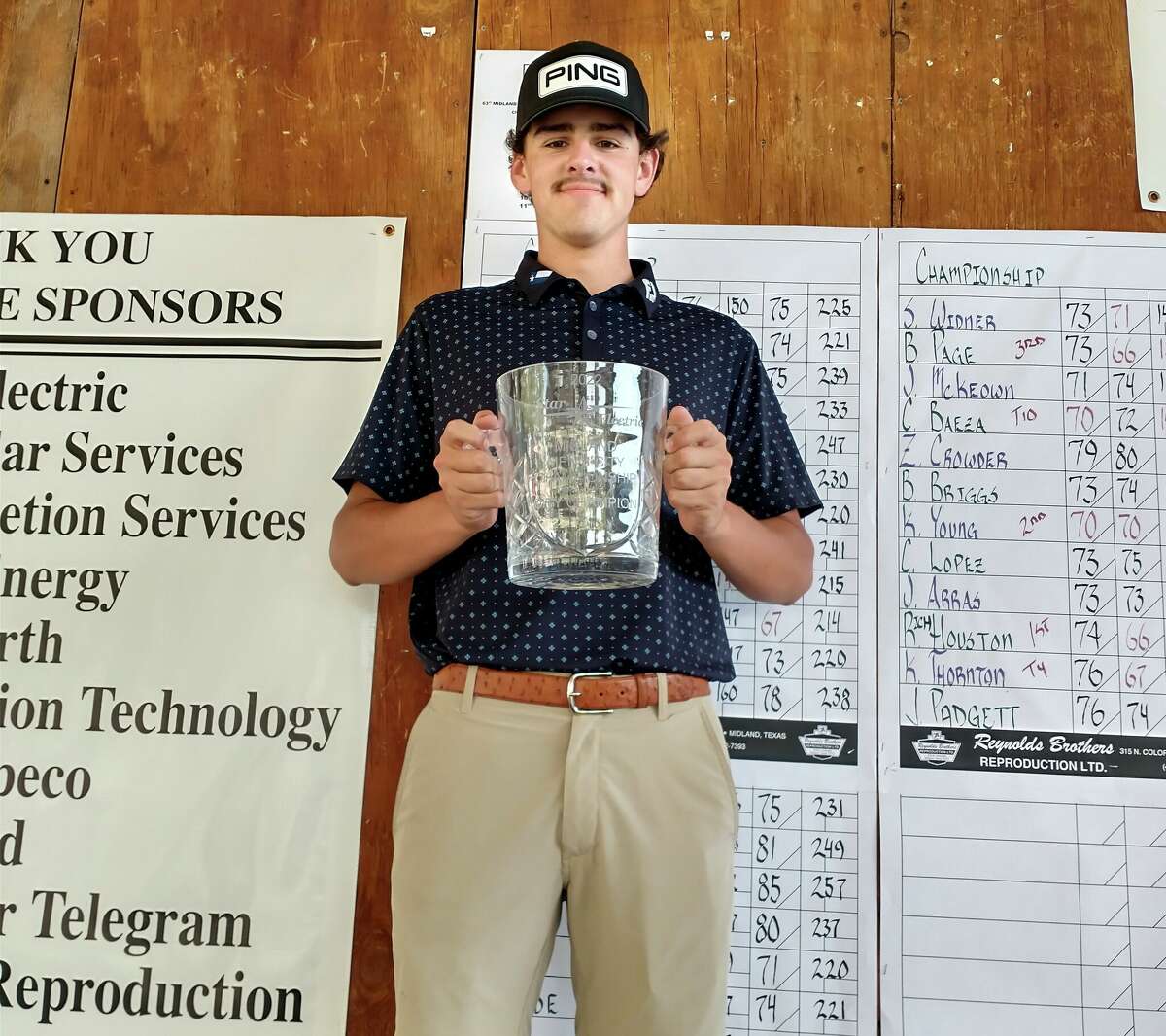 Richman Houston poses with the glass trophy after winning the Midland Men's City Championship on Sunday at Hogan Park Golf Course.